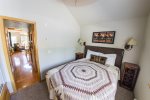 Get some rest in the master bedroom after a fun day in the mountains